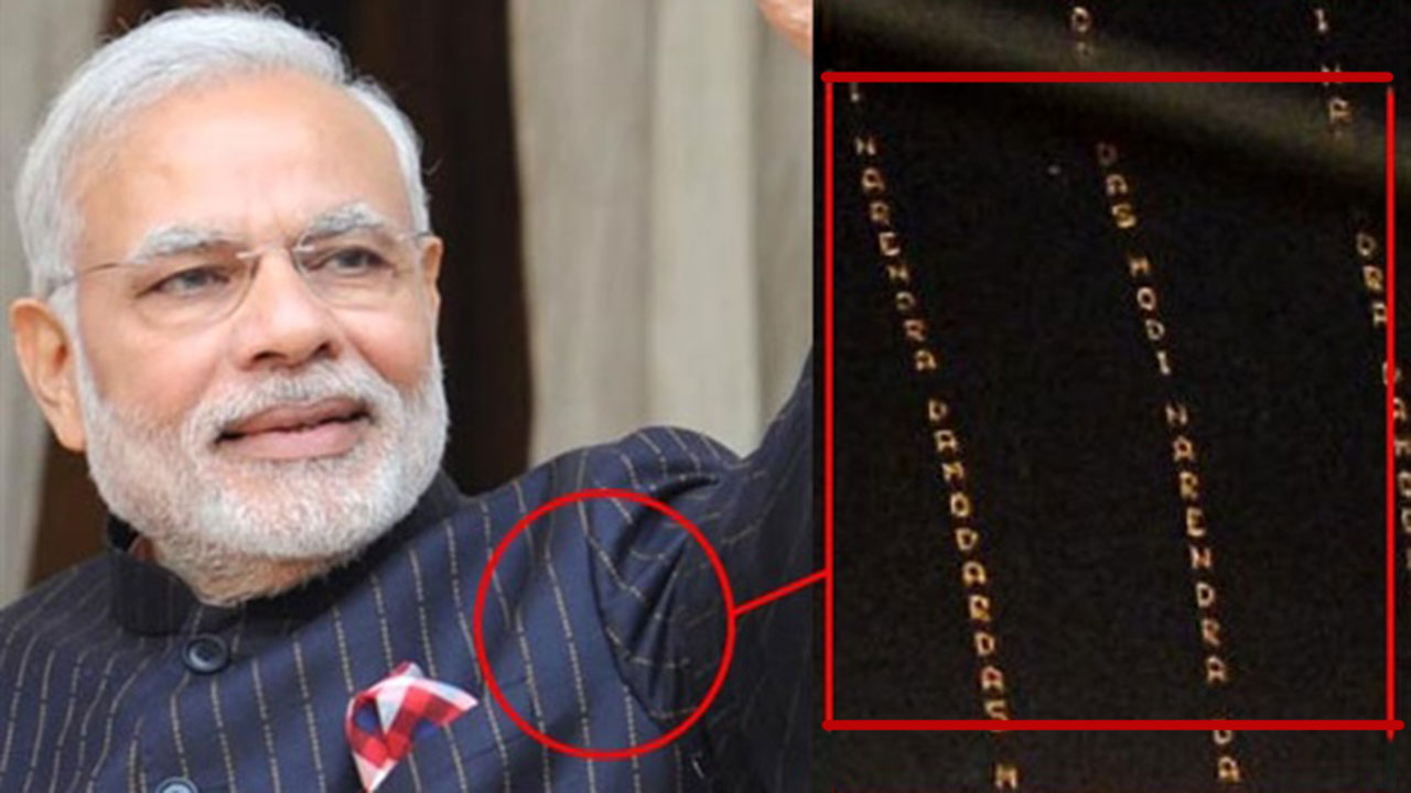 pm-modi-s-suit-with-his-name-on-it-enters-guinness-as-world-s-most